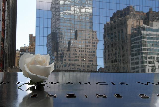 September 11th Ground Zero Memorial with a Rose on the grave. What do we leave behind when we are gone?