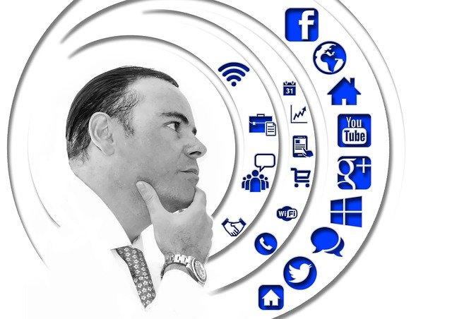 man with graphic of social media icons