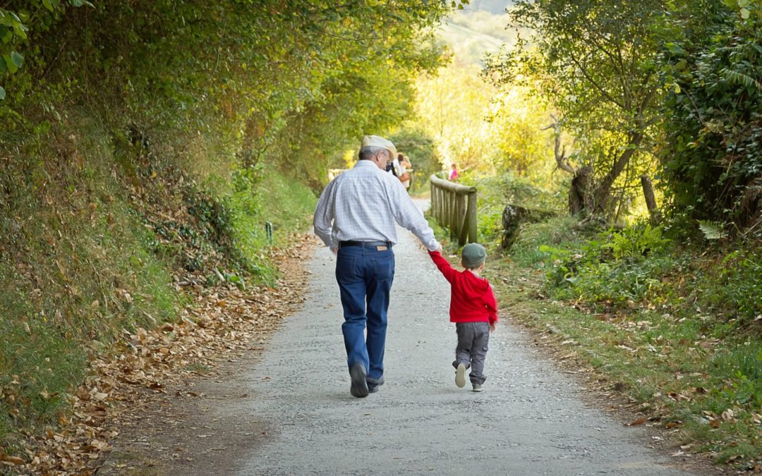 man walking with young boy