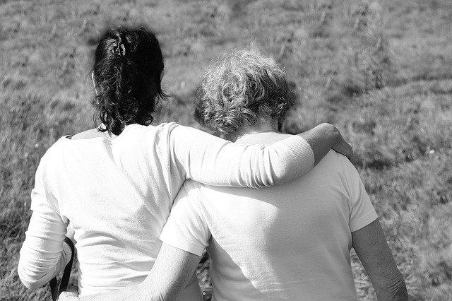 mother with arm around son