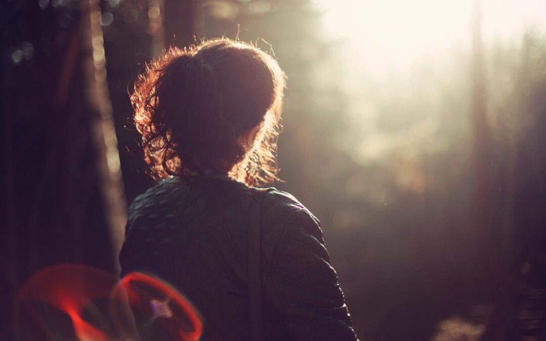 woman watching woods