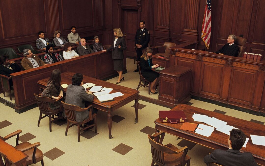 A bird's eye view of a busy court room.